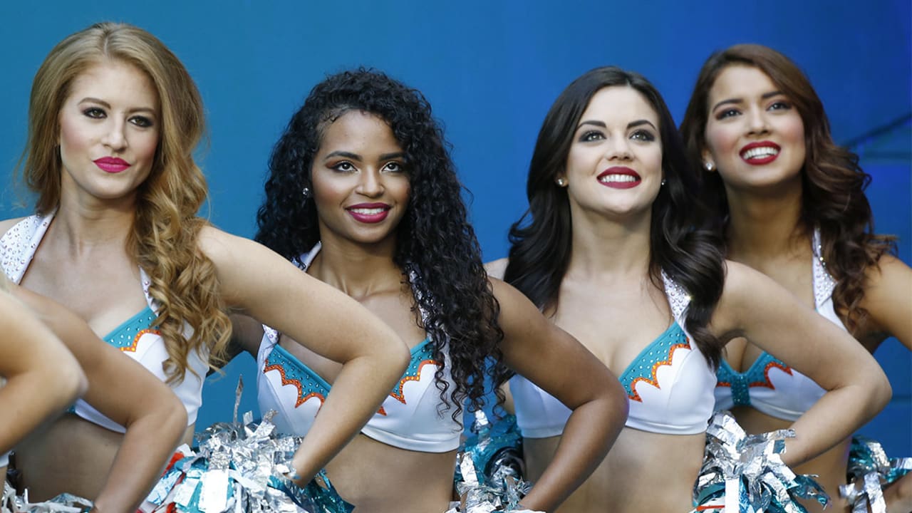 The Dallas Cowboys Cheerleaders perform during an NFL football game against  the Miami Dol…