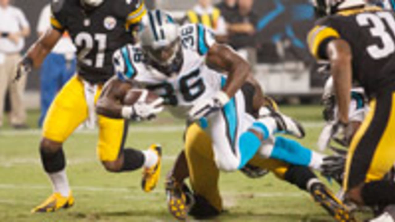 Cleveland Browns wide receiver Travis Benjamin runs the ball during  preseason NFL football game between the Browns and the St. Louis Rams  Saturday, Aug. 23, 2014, in Cleveland. (AP Photo/Tony Dejak Stock