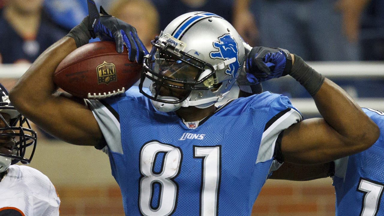 Oct. 30, 2011 - Denver, Colorado, U.S - A Detroit Lions fan wearing a CALVIN  JOHNSON jersey reacts to being on the big screen after Johnson scores a TD  against the Denver