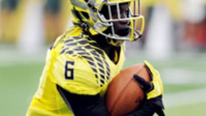 Oregon running back De'Anthony Thomas (6) runs for a touchdown against  Colorado during the first half of an NCAA football game in Boulder, Colo.,  Saturday, Oct. 22, 2011. (AP Photo/Jack Dempsey Stock