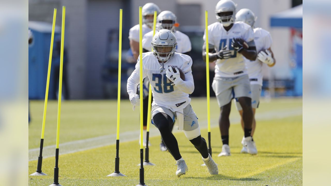 Detroit Lions running back Jonathan Williams (36) walks to a punt return  drill during an NFL football training camp practice at their team  headquarters in Allen Park, Mich., on Wednesday, Aug. 26