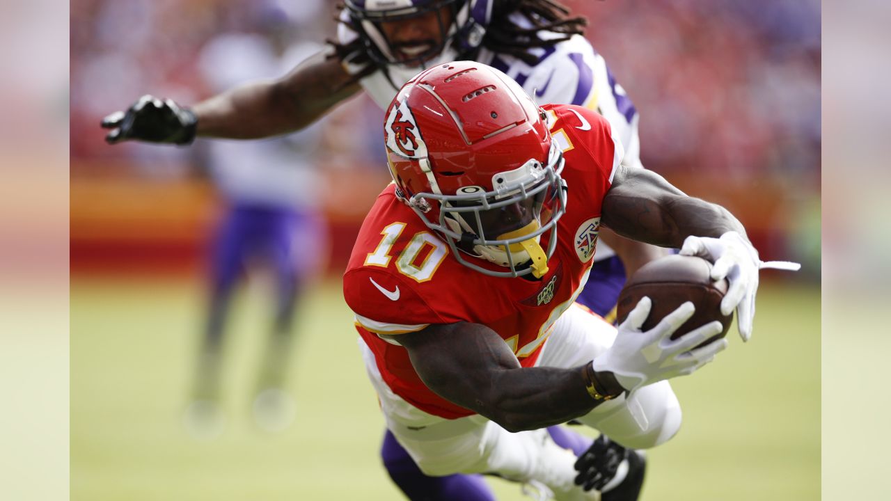 Kansas City Chiefs wide receiver Tyreek Hill (10) jumps into the stands and  fans celebrate his touchdown in the first quarter against the Minnesota  Vikings on Sunday, Nov. 3, 2019 at Arrowhead