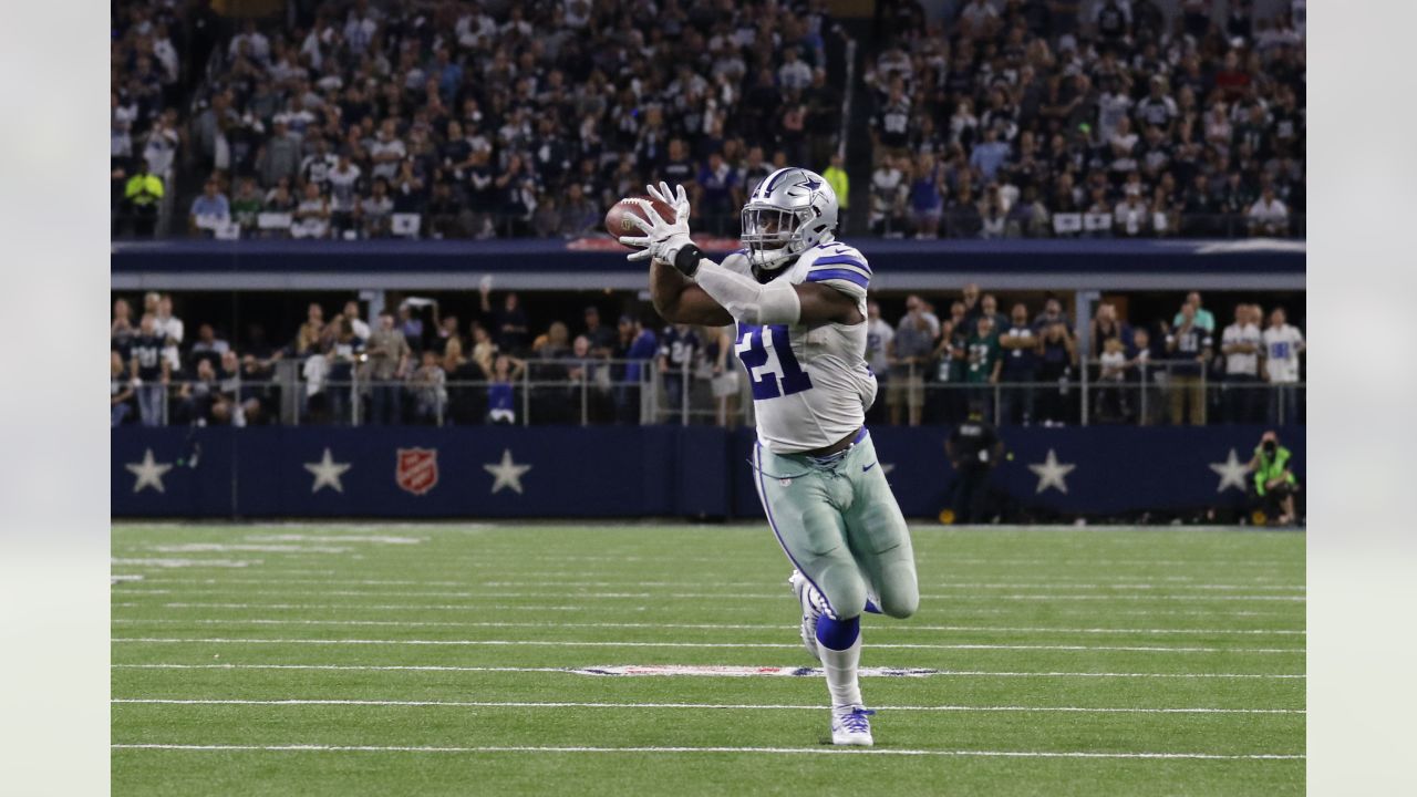 Dallas Cowboys running back Ezekiel Elliott walks on the field prior to the Pro  Football Hall of Fame NFL preseason game in Canton, Ohio, Thursday, Aug. 3,  2017. (AP Photo/David Richard Stock