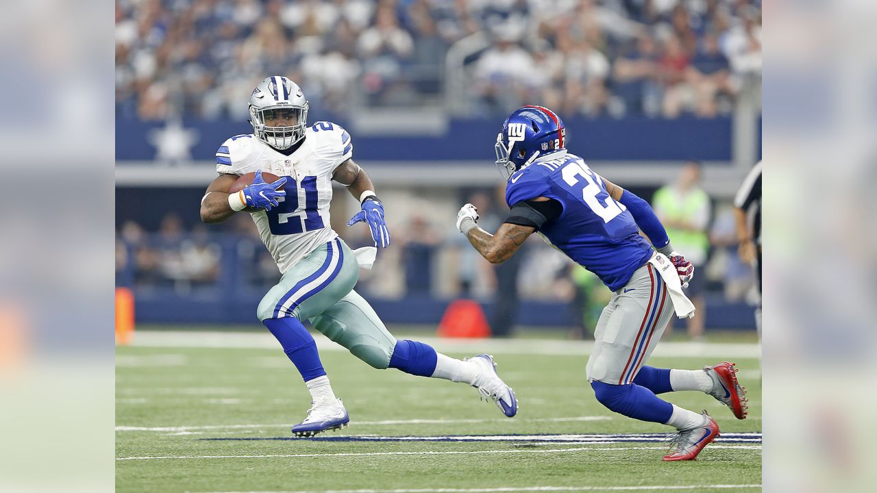 Dallas Cowboys running back Ezekiel Elliott walks on the field prior to the Pro  Football Hall of Fame NFL preseason game in Canton, Ohio, Thursday, Aug. 3,  2017. (AP Photo/David Richard Stock