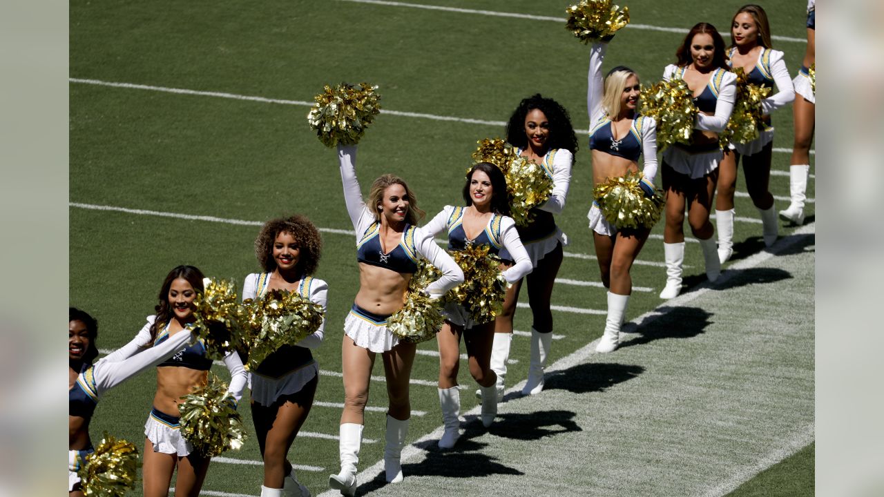 A Green Bay Packers cheerleader is seen before an NFL football