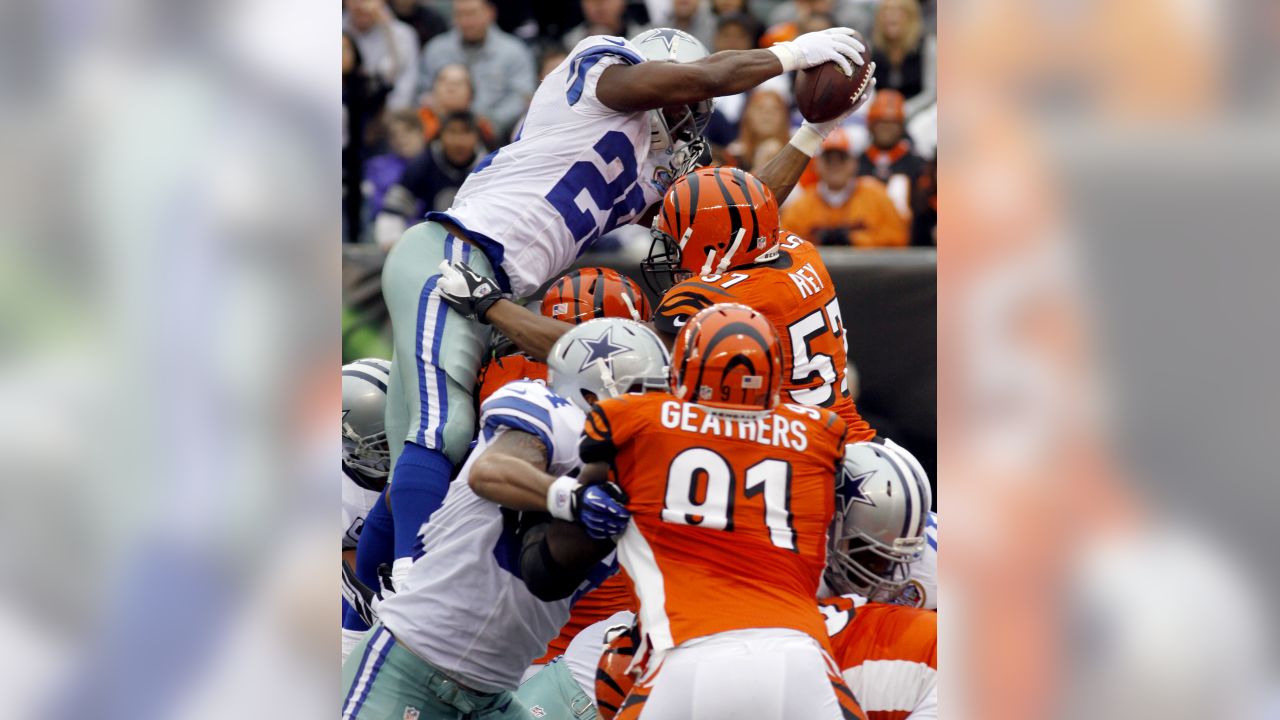 Denver Broncos wide receiver Vance Johnson (82) is tackled by Seattle  Seahawks Darrin Miller (9 …