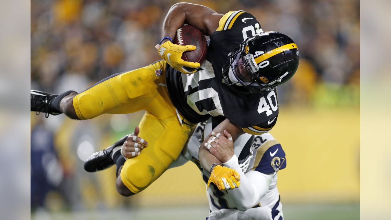 Los Angeles Rams free safety Eric Weddle (32) looks on from the