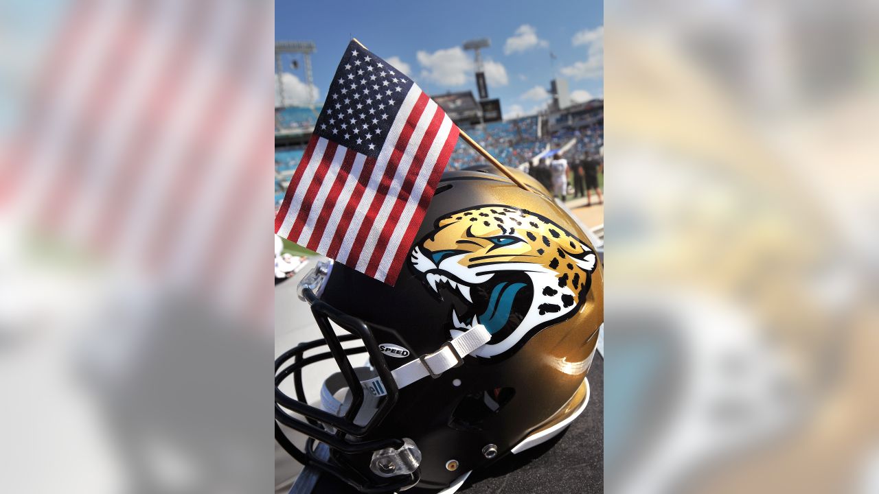 NFL team Jacksonville Jaguars mascot Jackson DeVille waves a