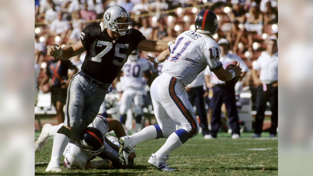 Lyle Alzado of the Denver Broncos looks on from the bench during an News  Photo - Getty Images