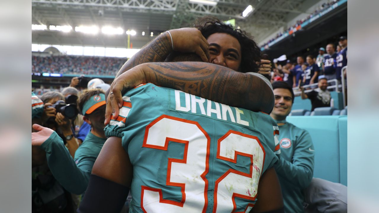 Miami Miracle': Baltimore Ravens' Running Back Kenyan Drake Throws Hoodie  Shade at New England Patriots - Sports Illustrated New England Patriots  News, Analysis and More