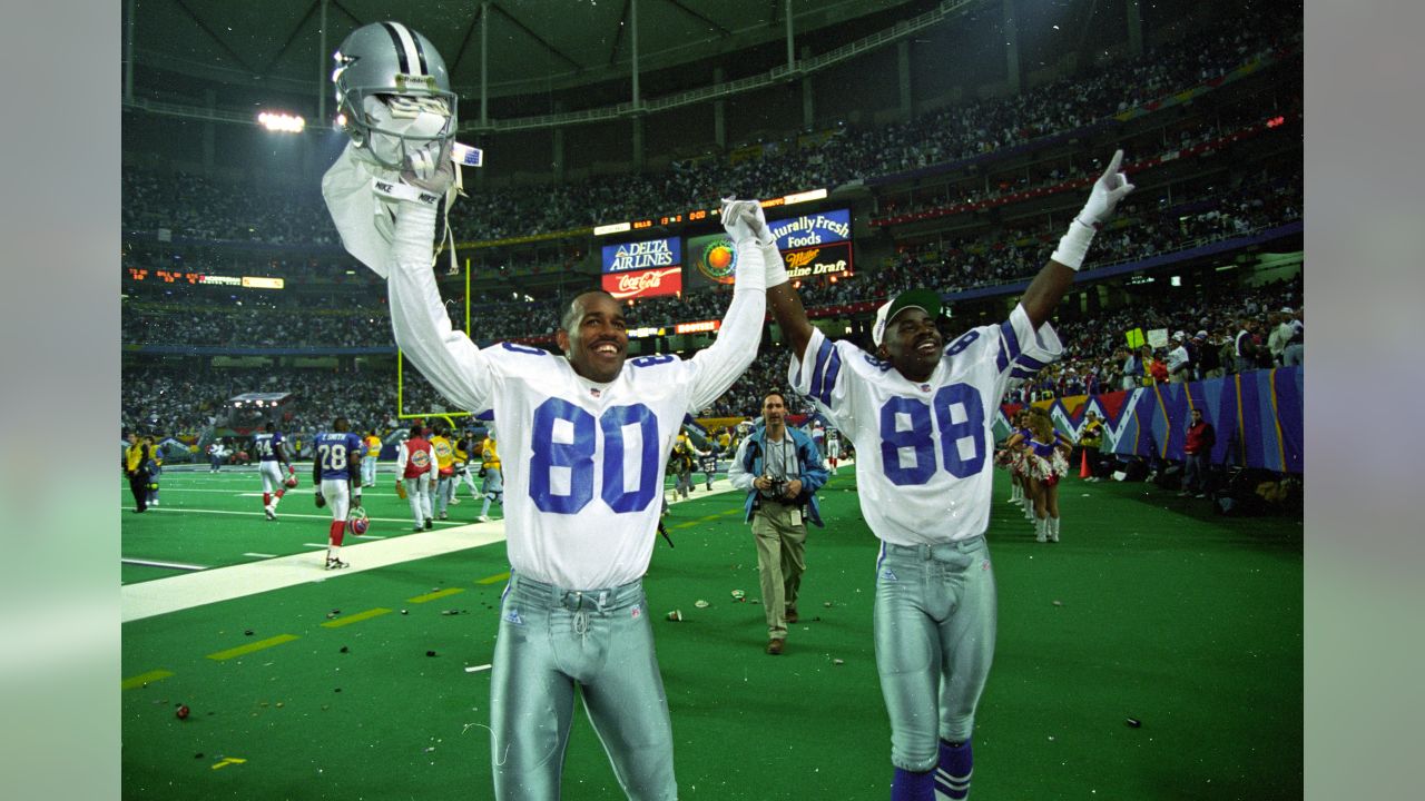 Dallas Cowboys defender Deion Sanders (21) knocks the ball away from San  Francisco 49ers receiver Jerry Rice (80) in the second quarter in Irving,  Texas, Sunday, Nov. 12, 1995. (AP Photo/Eric Gay