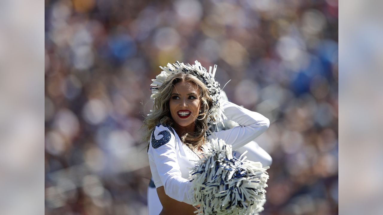 Los Angeles Rams cheerleaders on the field during a break in the