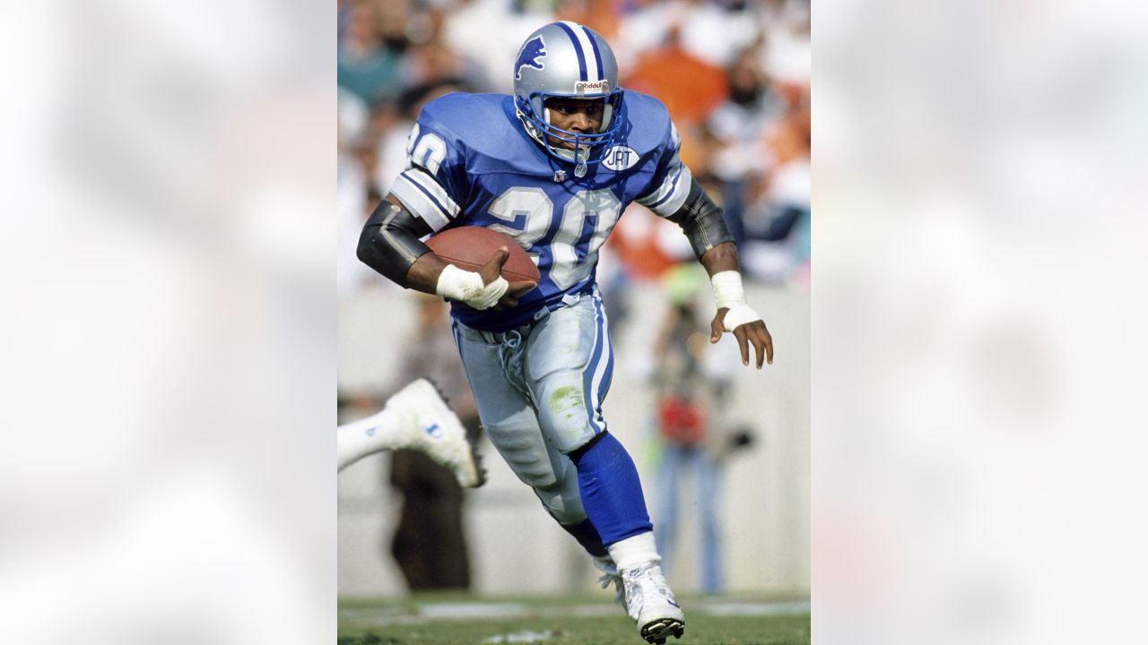 FILE - In this Jan. 12, 1992, file photo, Detroit Lions running back Barry  Sanders, left, looks for room to run against the Washington Redskins during  the second quarter of the NFC