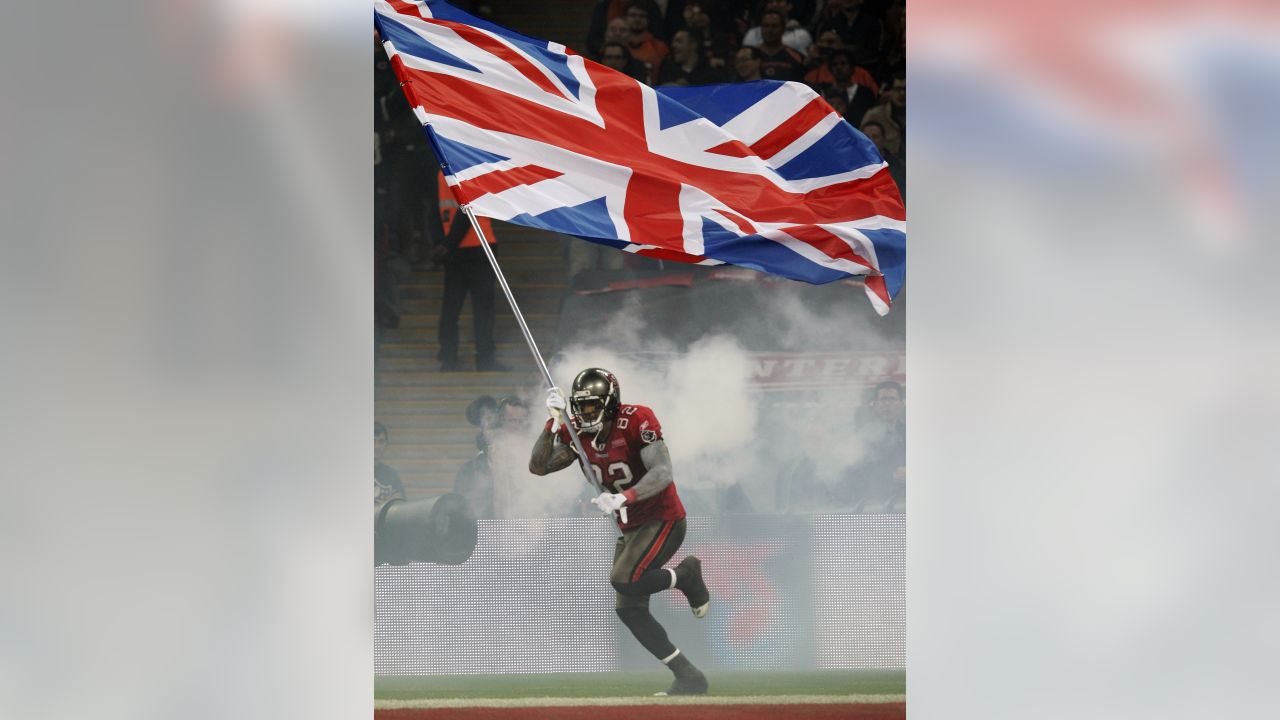 Denver Broncos Wide receiver Brandon Lloyd runs with the football during  their match with the San Francisco 49ers in the International NFL series  match at Wembley Stadium in London on October 31