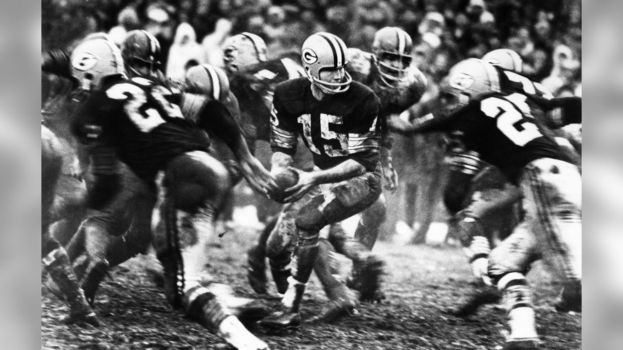 FILE - In this Dec. 31, 1967, file photo, players spill in all directions  as a fumble occurs in the third period of the National Football League  Championship game between the Dallas Cowboys and the Green Bay Packers at  Lambeau Field in Green Bay, Wisc