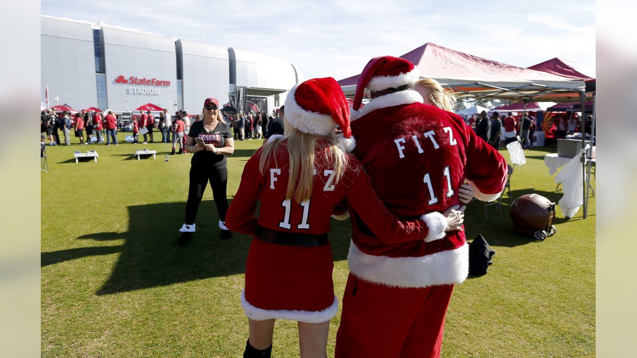 Minor League team sports Santa-suit uniforms for 'Christmas in July' game