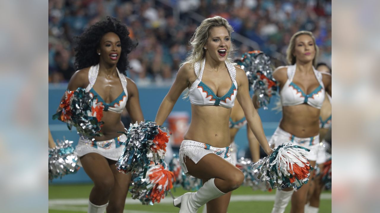 The Dallas Cowboys Cheerleaders perform during an NFL football game against  the Miami Dol…