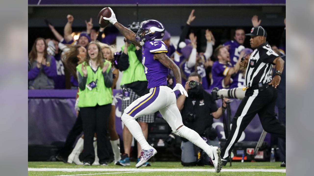 Minnesota Vikings wide receiver Stefon Riggs (14) makes a catch over New  Orleans Saints free safety Marcus Williams (43) on his way to the game  winning touchdown during the second half of