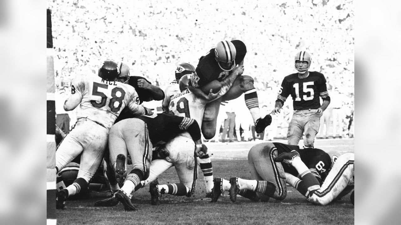 Life magazine photographers cover the first Super Bowl.