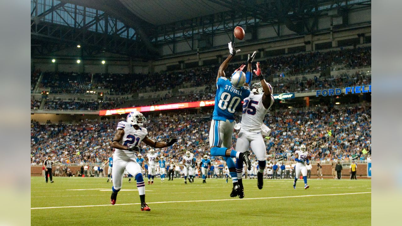 Buffalo Bills' LeSean McCoy, center, celebrates with Christian Wade (45)  after Wade scored a touchdown during the second half of an NFL preseason  football game against the Indianapolis Colts, Thursday, Aug. 8