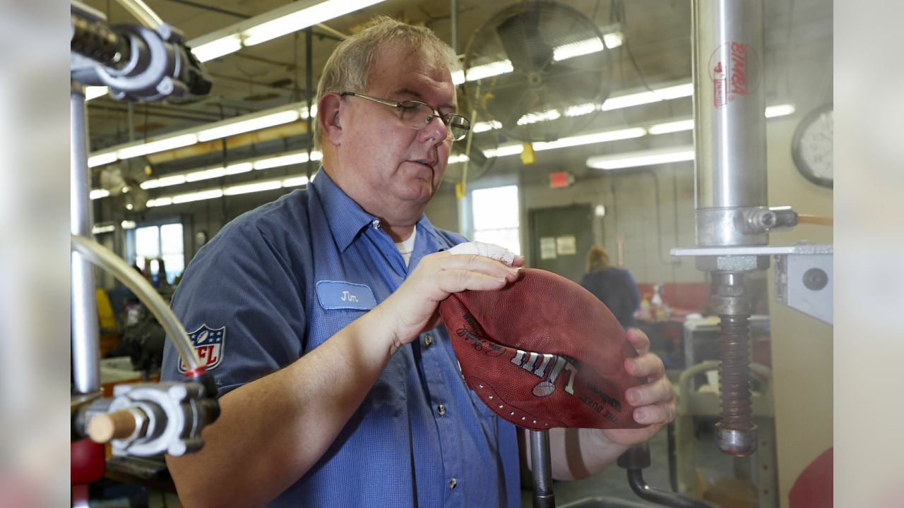 An official game ball for the NFL Super Bowl 50 football game is  photographed, Tuesday, Jan. 26, 2016. The Wilson Sporting Goods football  factory in Ada, Ohio has made the official Super