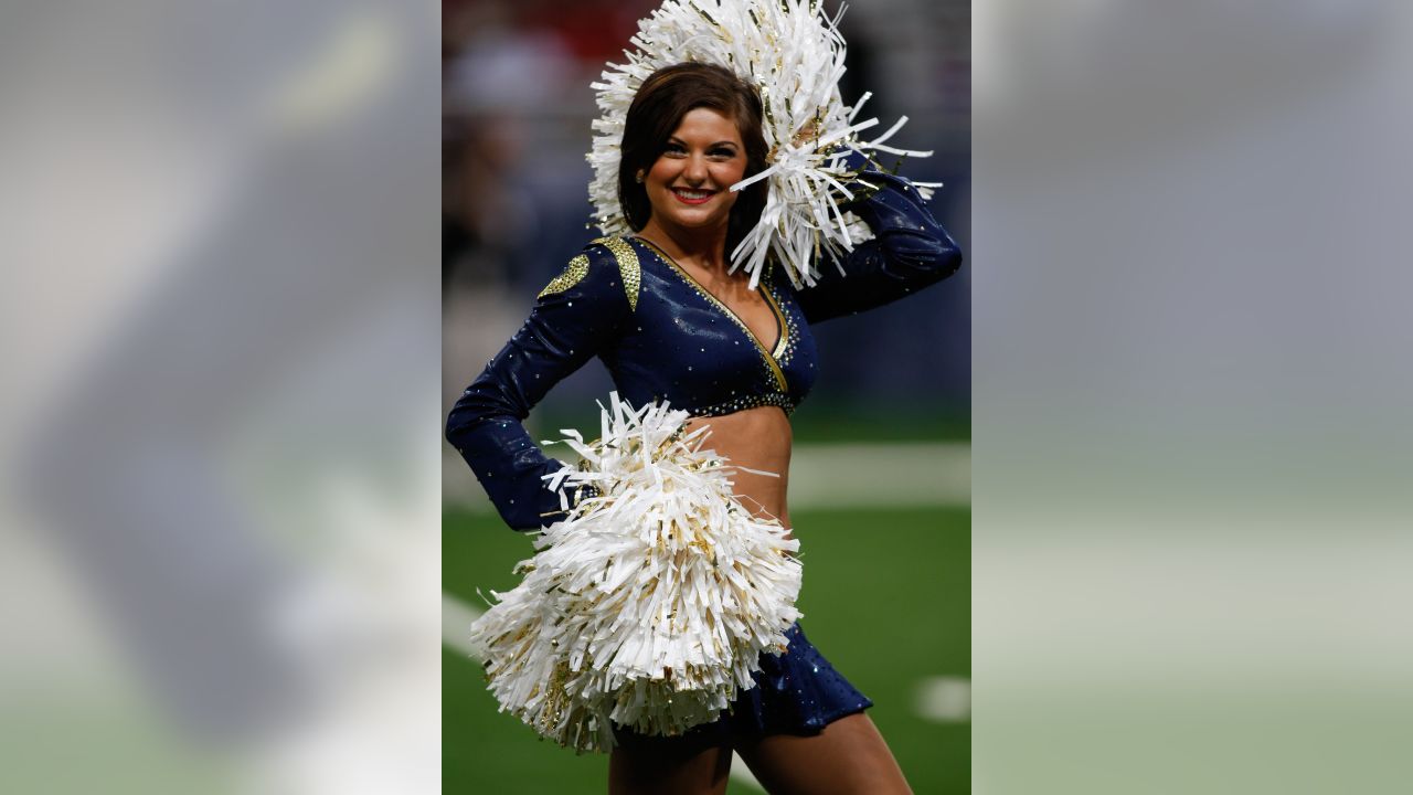 A St. Louis Rams cheerleader entertains the crowds during the Kansas City  Chiefs- St. Louis Rams football game in a Christmas outfit at the Edward  Jones Dome in St. Louis on December