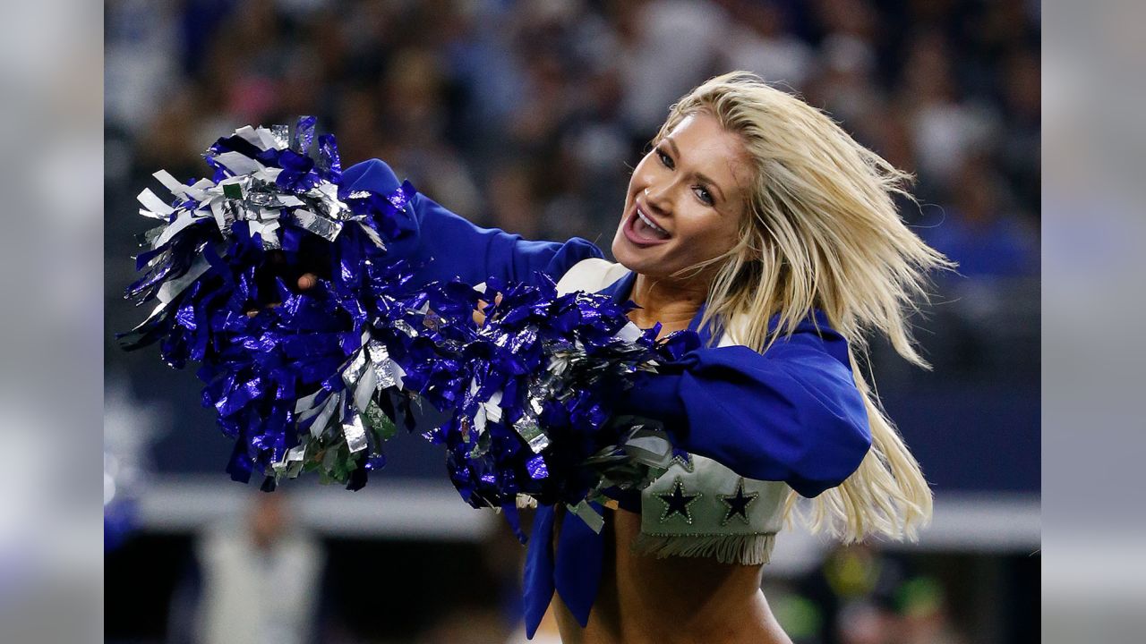 A Dallas Cowboys Cheerleader performs during the first half of an