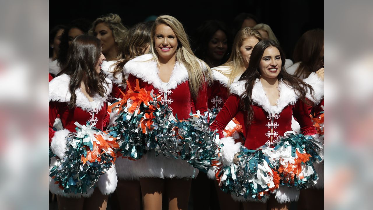 The Dallas Cowboys Cheerleaders perform during an NFL football game against  the Miami Dol…