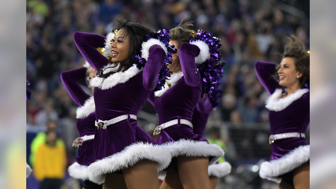 Photo: Broncos Cheerleader Performs in Christmas Costumes in