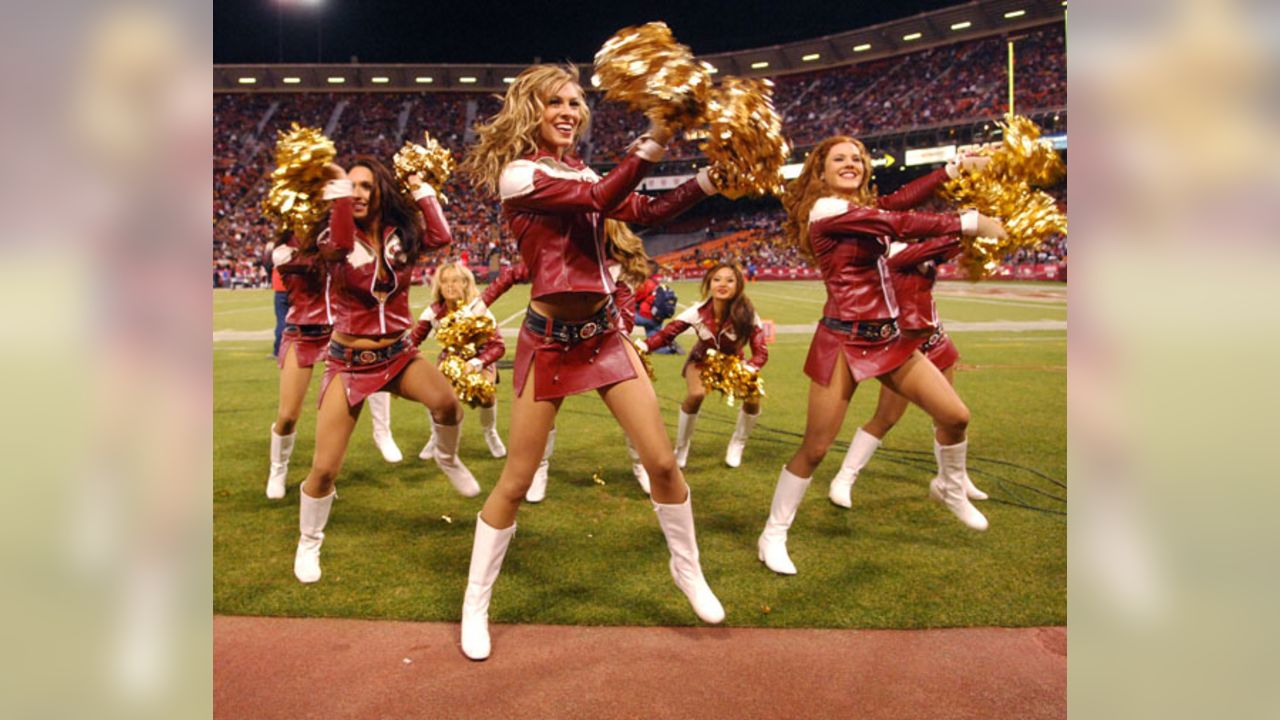 A St. Louis Rams cheerleader entertains the crowds during the Kansas City  Chiefs- St. Louis Rams football game in a Christmas outfit at the Edward  Jones Dome in St. Louis on December