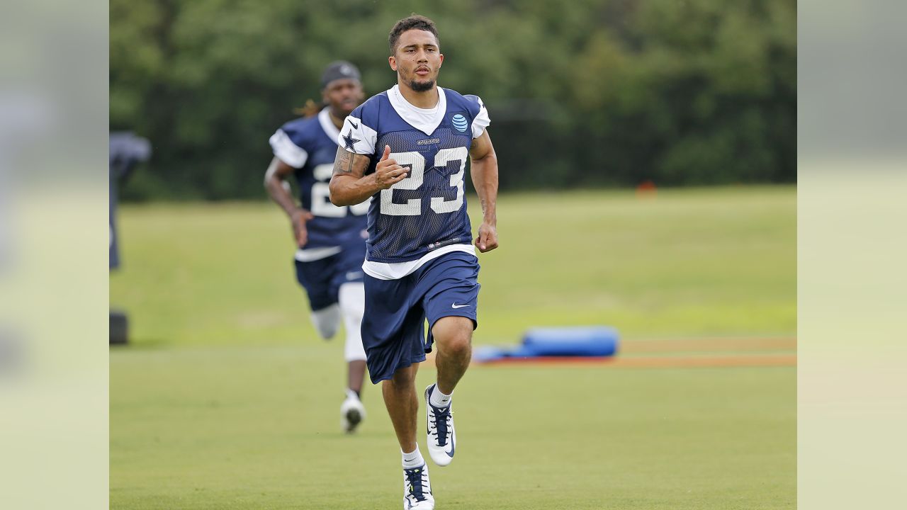 Denver Broncos running back Mike Boone (26) takes part in a drill at an NFL  organized