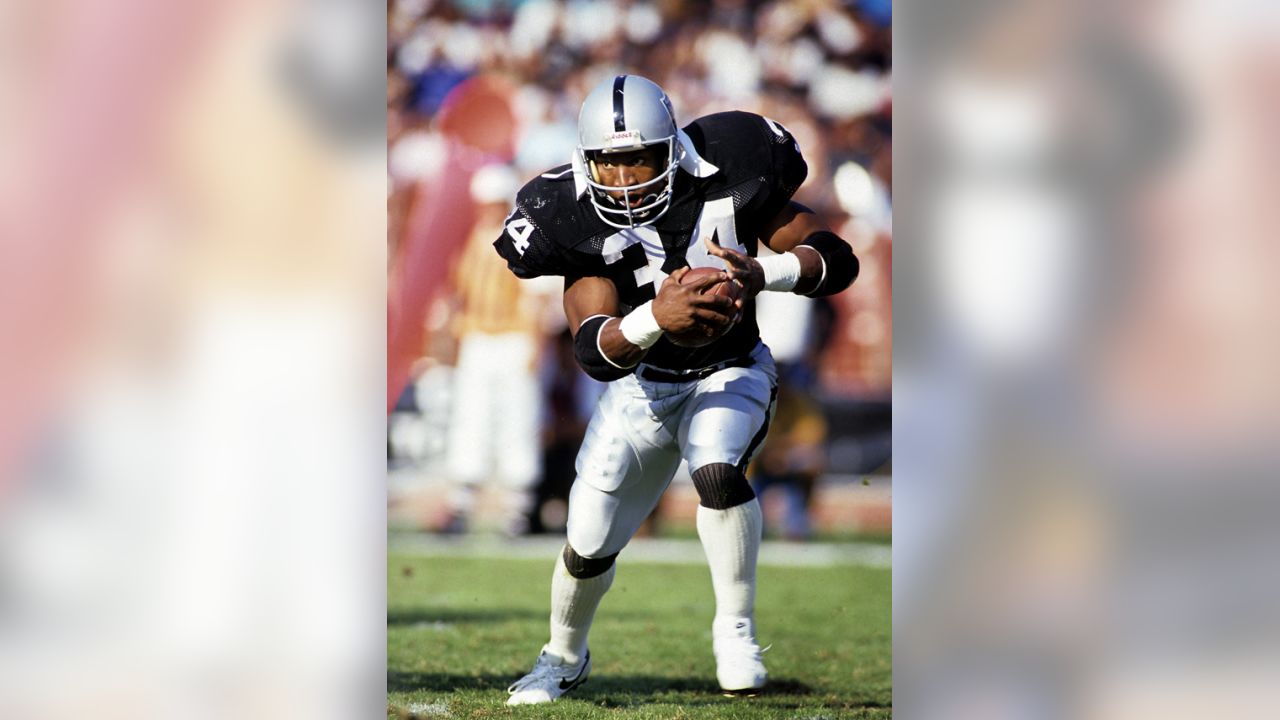 25 Nov. 1990: Los Angeles Raiders running back Bo Jackson (34) in action  during a game against the Kansas City Chiefs played at the Los Angeles  Memorial Coliseum in Los Angeles, CA. (