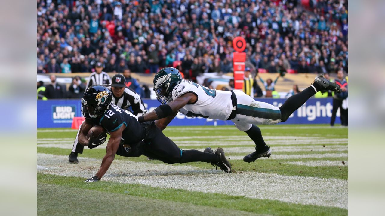 Wembley Stadium, London, UK. 28th Oct, 2018. NFL in London, game three,  Philadelphia Eagles versus Jacksonville Jaguars; Jalen Ramsey of the  Jacksonville Jaguars tackles Josh Adams of the Philadelphia Eagles Credit:  Action