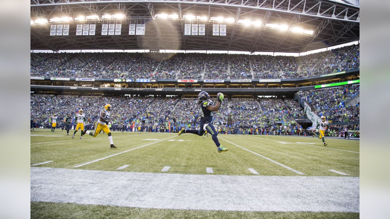 Seattle Seahawks' Marshawn Lynch runs on the field before an NFL