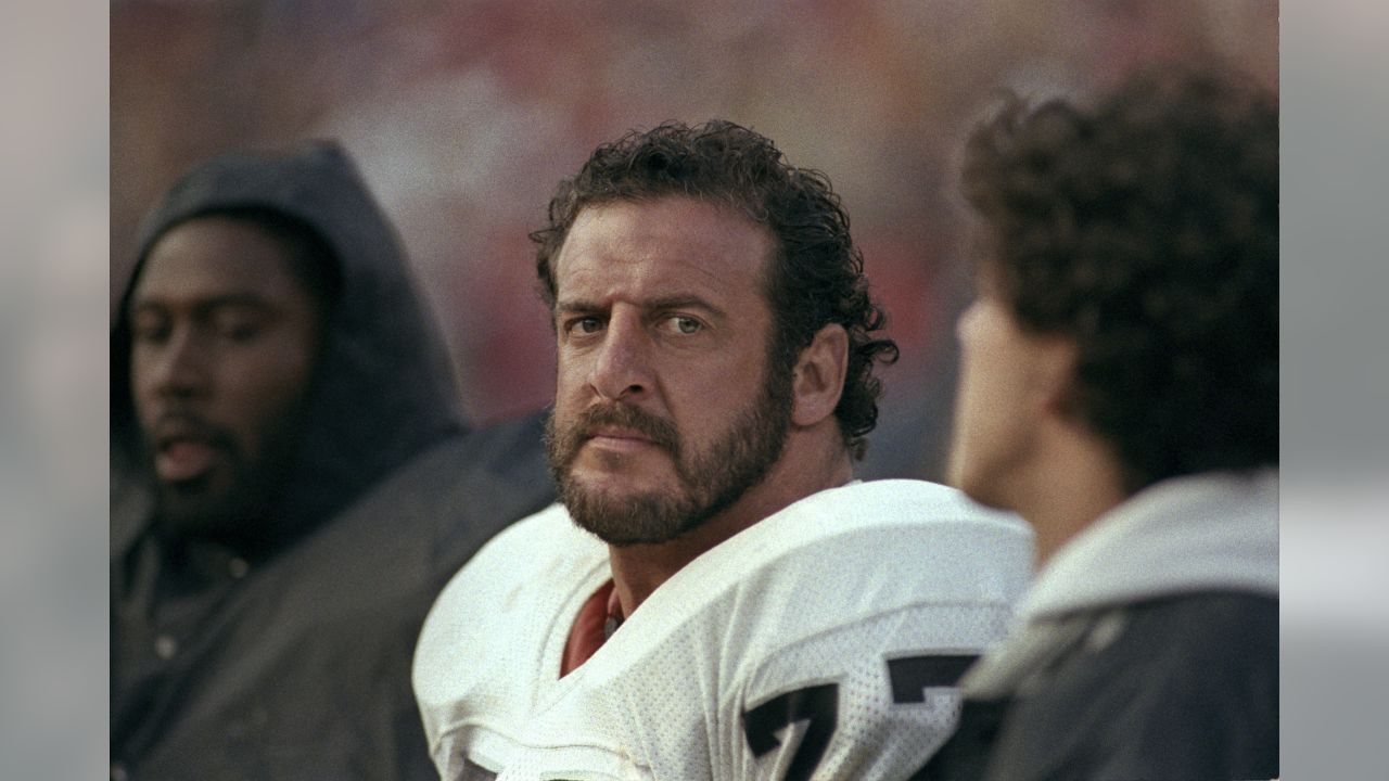 Los Angeles Raiders Lyle Alzado gives a fist of Victory after the Raiders  beat the Pittsburgh Steelers in playoff game in Los Angeles on Sunday, Jan.  2, 1984, 38-10. The victory advanced