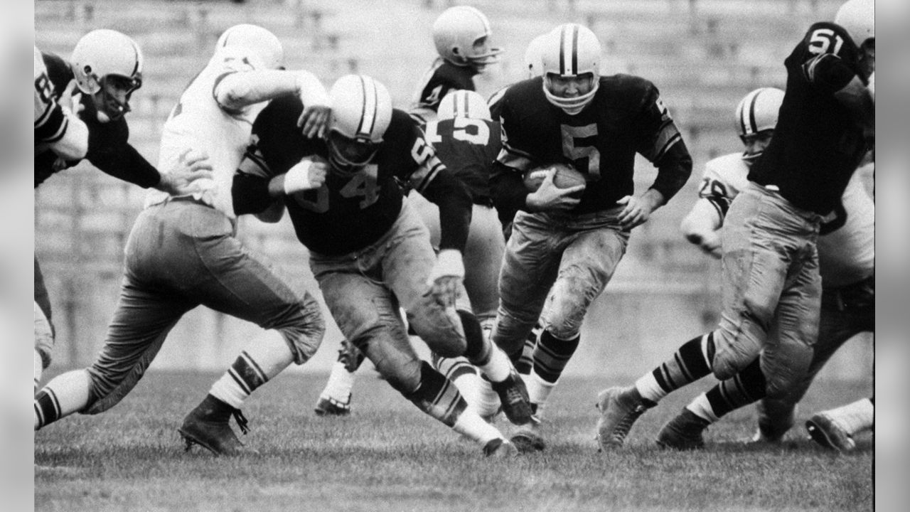 Green Bay Packers Paul Hornung and Gary Knafelc on sidelines