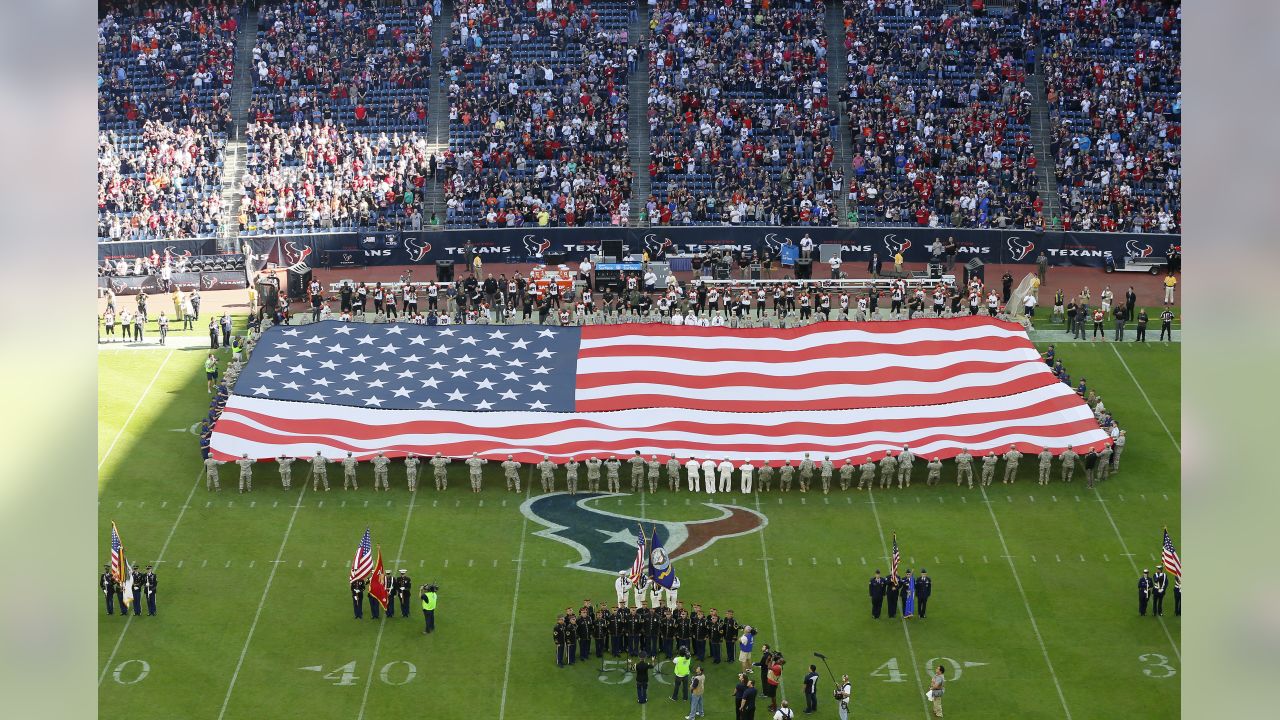 A giant American flag is unfurled on the field of Citizens Bank