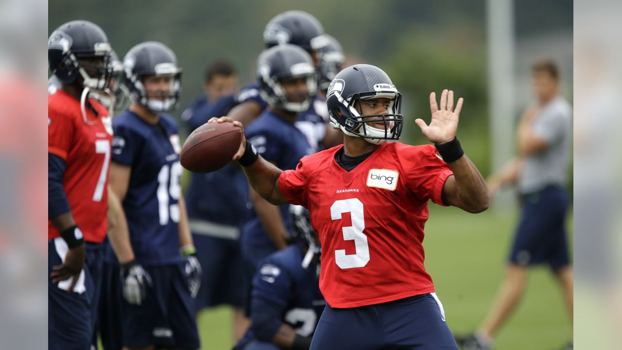 Seattle Seahawks cornerback Richard Sherman, left, begins to take off the  jersey that belongs to injured wide receiver Sidney Rice, right, after  Sherman wore it as a joke during NFL football training camp Friday, Aug. 2,  2013, in Renton, Wash. (AP Phot