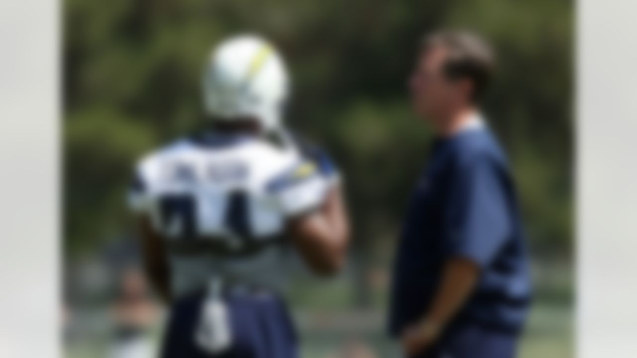 SAN DIEGO - MAY 03: Running back LaDainian Tomlinson #21 of the San Diego Chargers speaks with Head Coach Norv Turner during the Chargers Mini-Camp on May 3, 2008 at the Chargers Practice Facility in San Diego, California. (Photo by Donald Miralle/Getty Images)