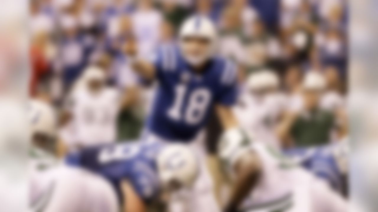 Indianapolis Colts quarterback Peyton Manning (18) in action during the second quarter of an NFL AFC wild card football playoff game between the New York Jets and the Indianapolis Colts in Indianapolis, Saturday, Jan. 8, 2011 in Manning's last game playing for the Colts. (AP Photo/Nam Y. Huh)