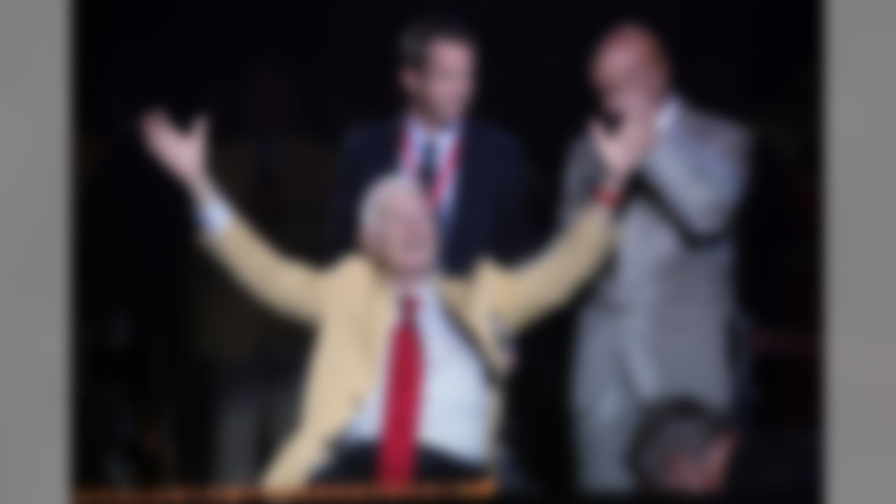 NFL Films founder Ed Sabol thanks the crowd after receiving his Hall of Fame jacket during the Pro Football Hall of Fame enshrinees dinner at the Civic Auditorium in Canton, Ohio on Friday Aug. 5, 2011. (Ben Liebenberg/NFL)