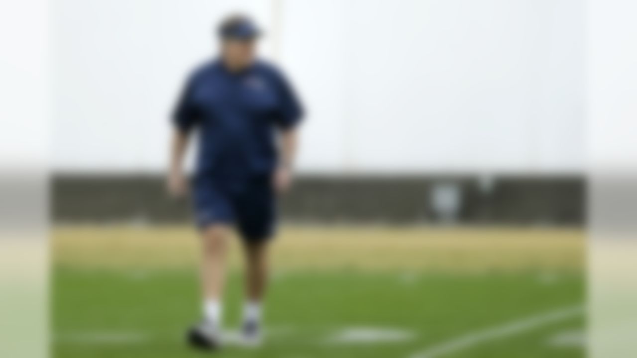 New England Patriots head coach Bill Belichick walks across the field during practice Friday, Jan. 30, 2015, in Tempe, Ariz. The Patriots play the Seattle Seahawks in NFL football Super Bowl XLIX Sunday, Feb. 1. (AP Photo/Mark Humphrey)