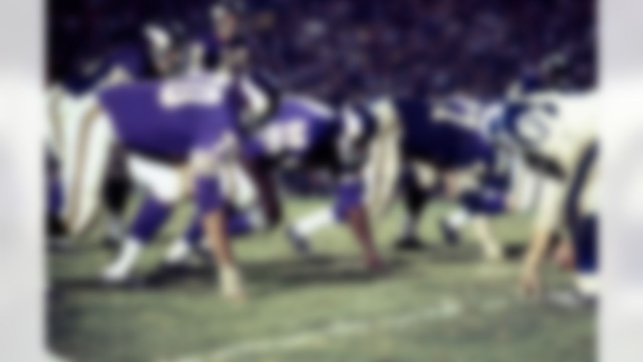 Minnesota Vikings defensive end Jim Marshall (70) and defensive tackle Alan Page (88) line up in three-point stances during their game with the Los Angeles Rams in Los Angeles, Calif., Sept. 22, 1967. The Rams won, 39-3. (National Football League)