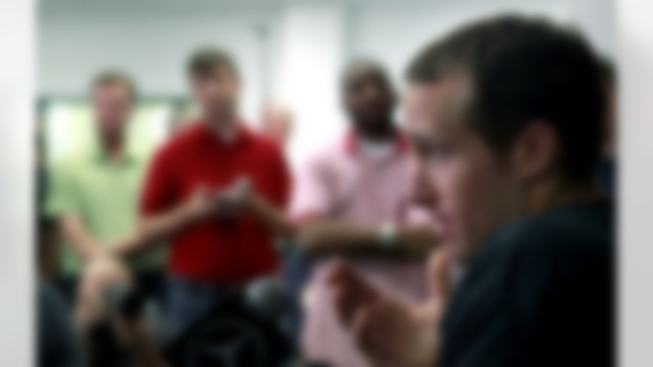 New Orleans Saints quarterback Drew Brees talks to reporters after players reported for training camp at their NFL football training facility in Metairie, La., Tuesday, July 24, 2012. (AP Photo/Gerald Herbert)