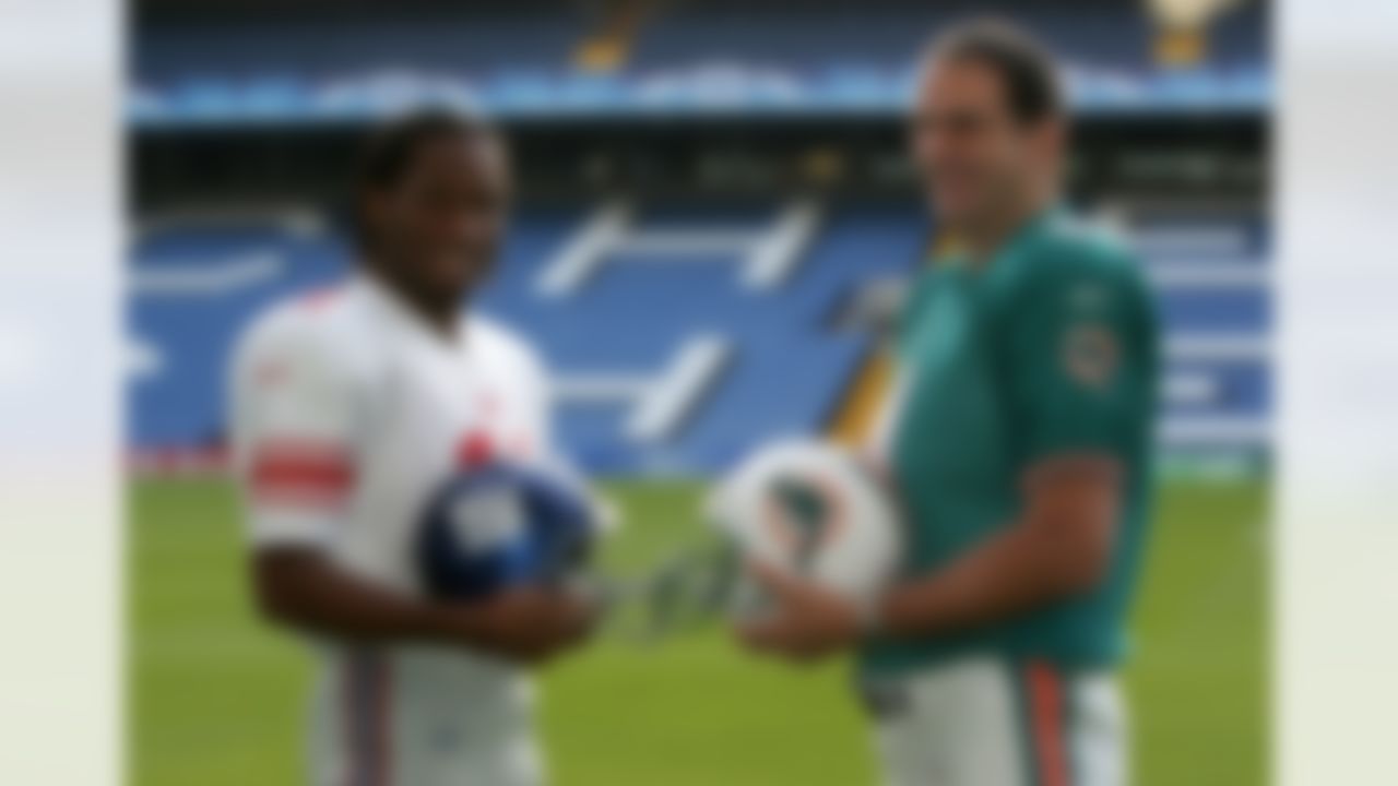 LONDON - OCTOBER 23: Honorary Captains for the forthcoming NFL match Didier Drogba of Chelsea FC and Former England Rugby Union captain Martin Johnson pose at Stamford Bridge on 23 October, 2007 in London, England. The NY Giants and Miami Dolphins will play at Wembley Stadium on Sunday October 28. (Photo by Christopher Lee/Getty Images)