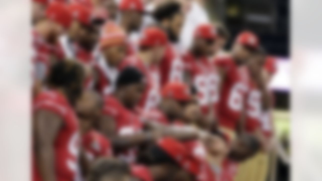 San Francisco 49ers players line up for a team photo during media day for the NFL Super Bowl XLVII football game Tuesday, Jan. 29, 2013, in New Orleans. (AP Photo/Charlie Riedel)
