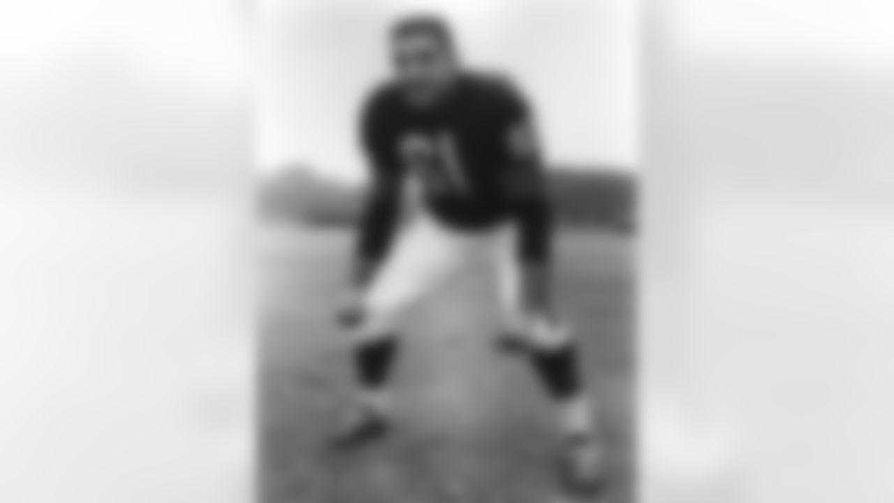 Chicago Bears linebacker Bill George (61) poses during training camp at St. Joseph's College in Rensselaer, Ind., Aug. 10, 1962. It has been alleged that George was the first true middle linebacker in football and, inadvertently, the creator of the 4-3 defense. (National Football League)