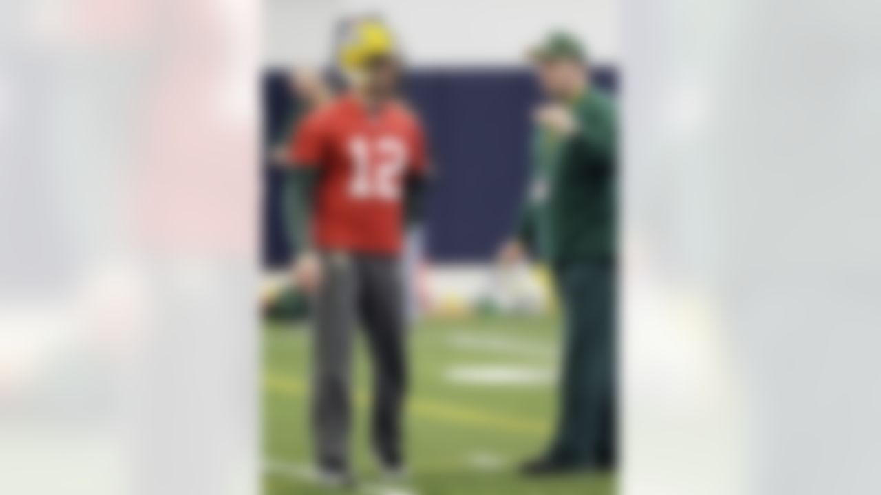 Green Bay Packers coach Mike McCarthy, right, talks with Aaron Rodgers during practice, Thursday, Feb. 3, 2011, in Dallas. Green Bay will face the Pittsburgh Steelers in the NFL football Super Bowl XLV Sunday. (AP Photo/Eric Gay)