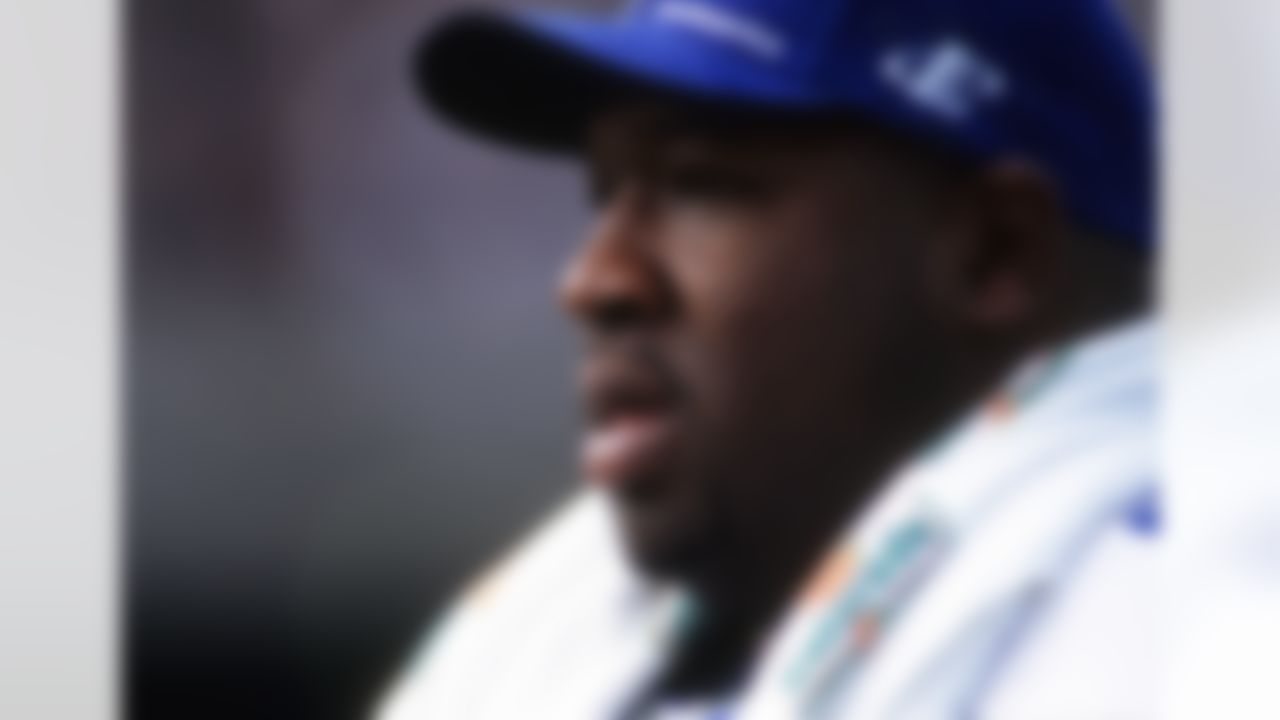 Seattle Seahawks defensive lineman Cortez Kennedy (96) rests during an NFL football game against the Oakland Raiders on Sunday, Nov. 15, 1998, in Oakland. The Raiders won the game, 20-17. (AP Photo/Greg Trott)