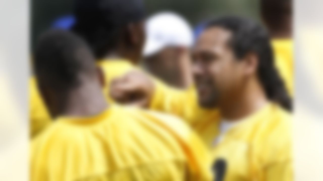Pittsburgh Steelers defensive back Troy Polamalu, right, points at Ryan Clark as the two talk during NFL football training camp in Latrobe, Pa., Thursday, July 26, 2012. (AP Photo/Keith Srakocic)